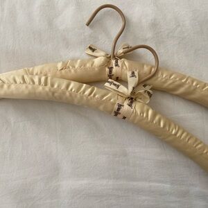2 vintage neiman marcus padded satin clothes hanger neutral color with ribbon